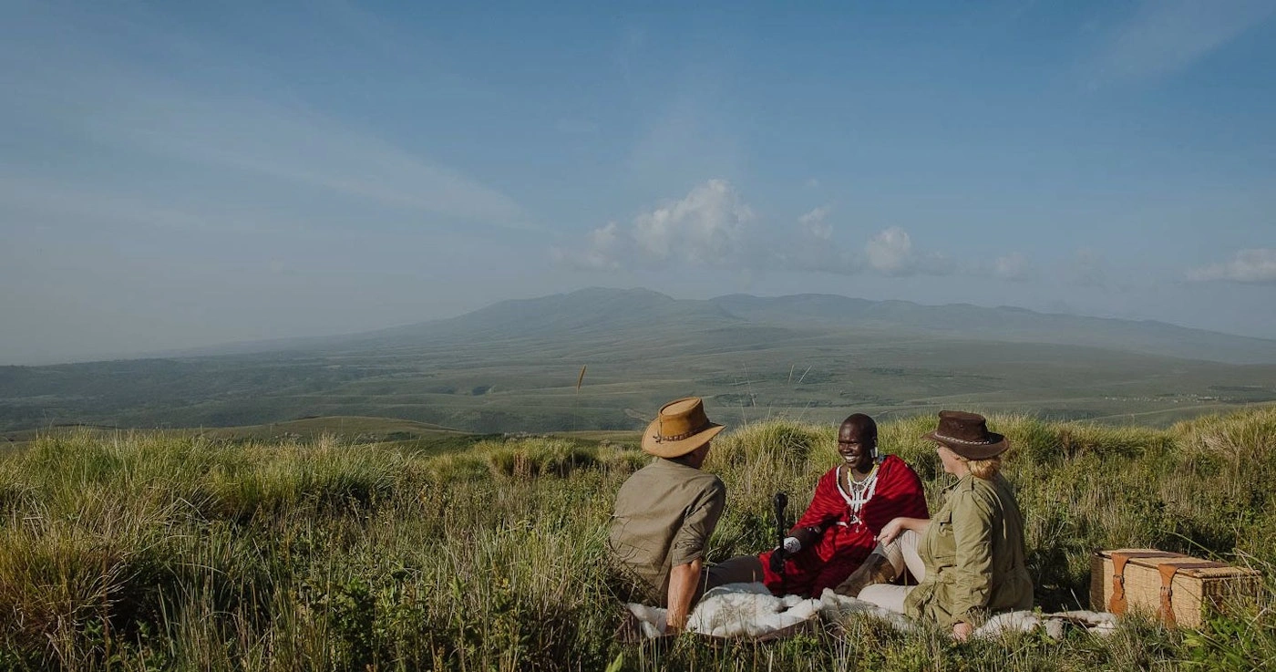 Safari picnic setup in the Ngorongoro Highlands overlooking Ngorongoro Crater, Tanzania.